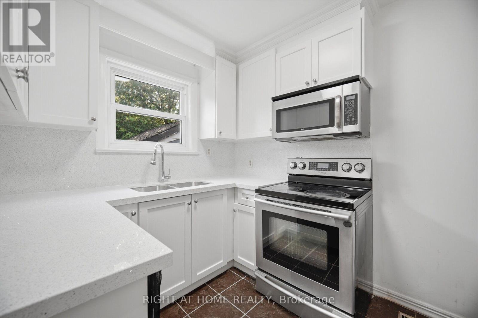 36 Rushley Drive, Toronto, ON - Indoor Photo Showing Kitchen With Double Sink