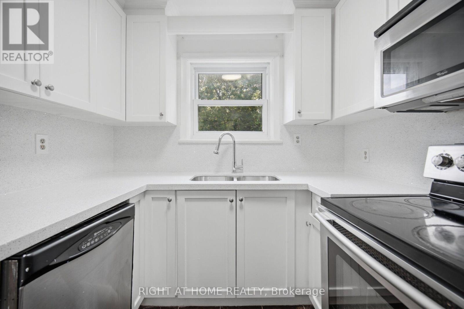 36 Rushley Drive, Toronto, ON - Indoor Photo Showing Kitchen With Double Sink