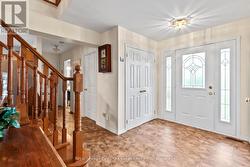 hall to garage/ 2pc bath/ laundry - 