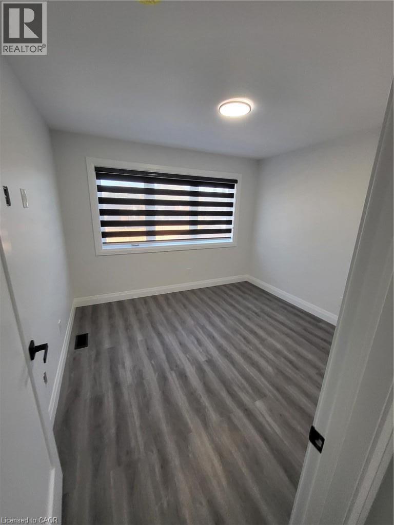 Unit 2 (upper level at rear, typical finish - 169 Fifth Avenue, Kitchener, ON - Indoor Photo Showing Other Room