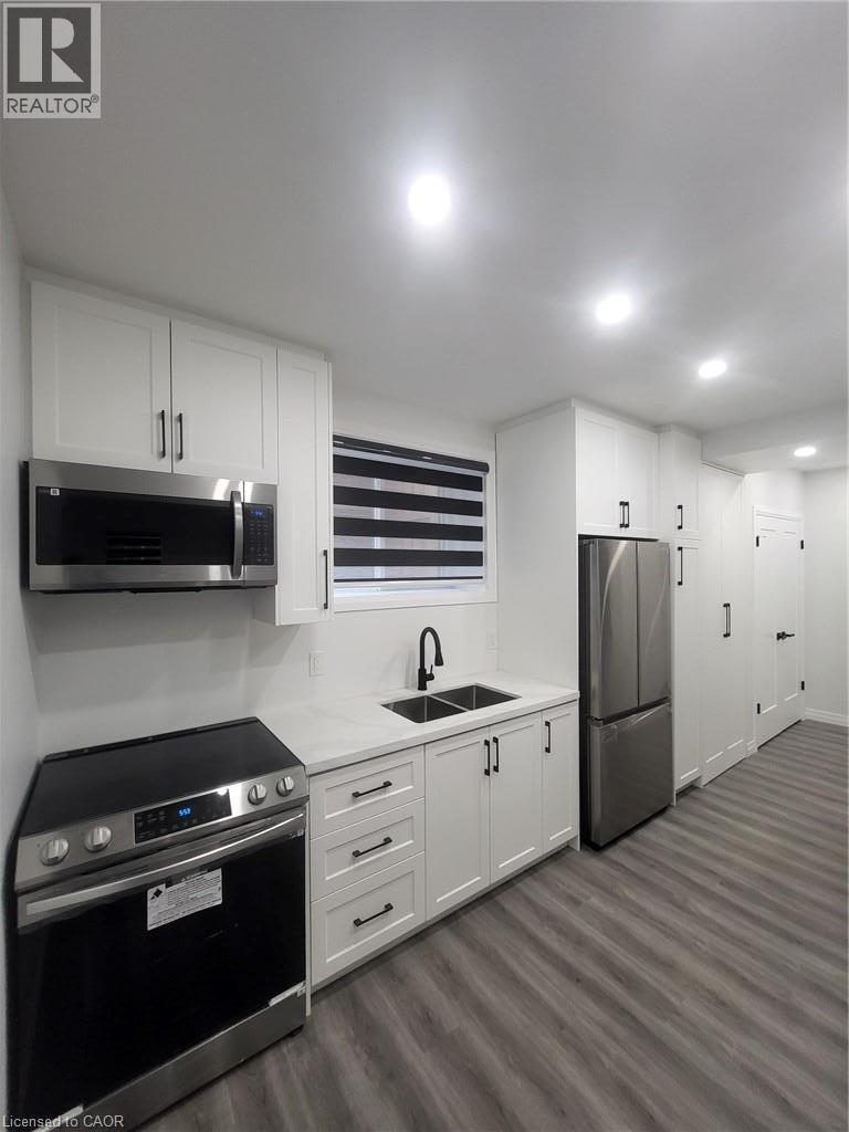 Unit 3 (lower level, typical finish) - 169 Fifth Avenue, Kitchener, ON - Indoor Photo Showing Kitchen With Double Sink