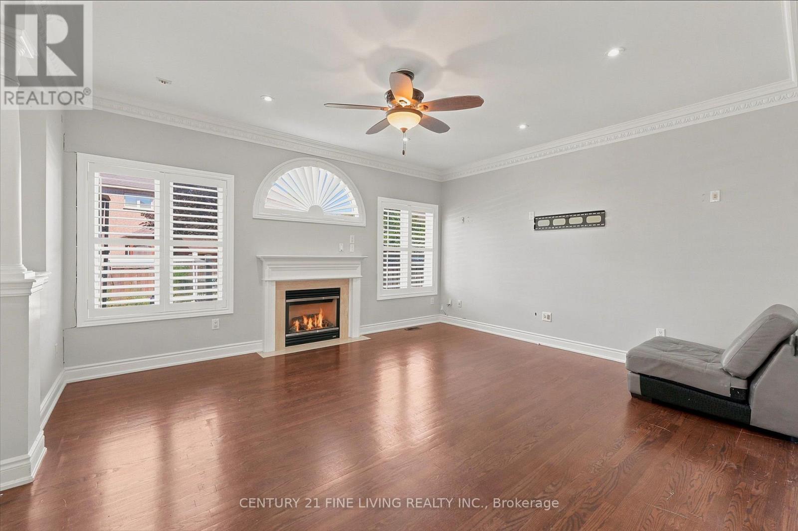 38 Eiffel Boulevard, Brampton, ON - Indoor Photo Showing Living Room With Fireplace