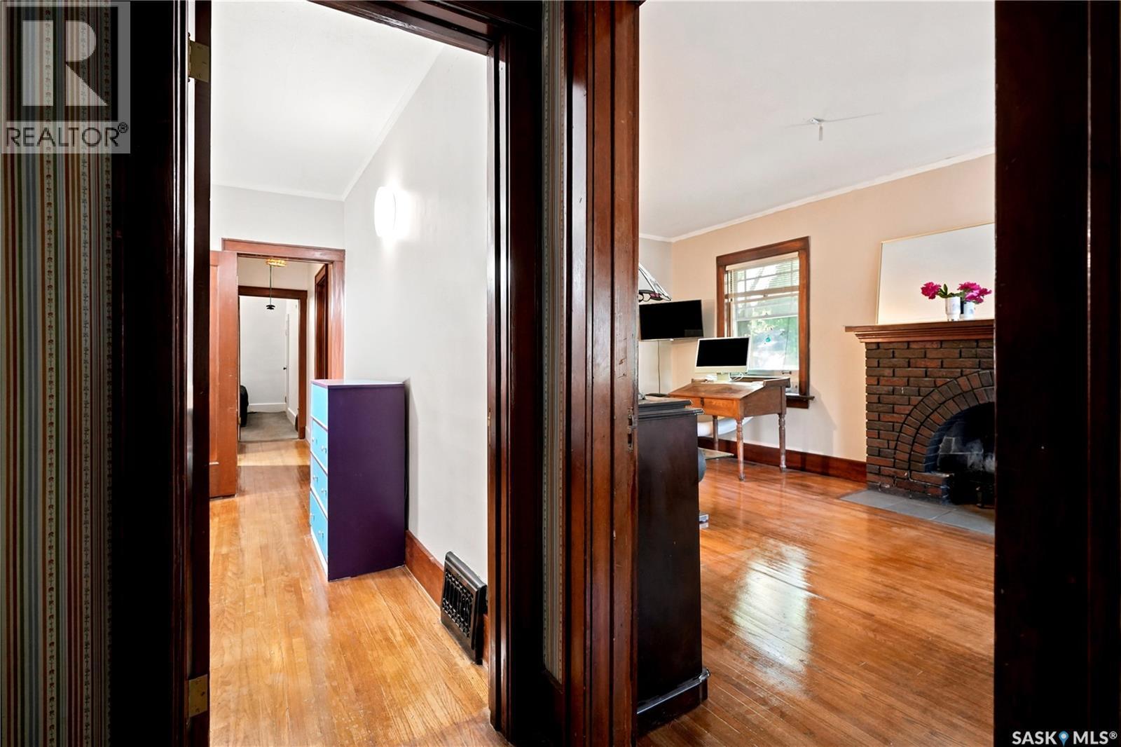 3300 Victoria Avenue, Regina, SK - Indoor Photo Showing Other Room With Fireplace