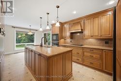 GRANITE COUNTERS AND POT DRAWERS - 
