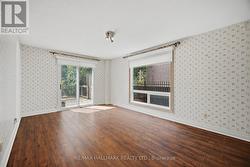 LIBRARY/MAIN FLOOR BEDROOM - 