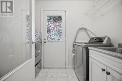 MAIN FLOOR LAUNDRY, SIDE ENTRY - 