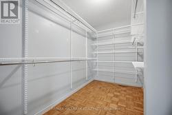 WALK IN CLOSET WITH ORGANIZERS - 