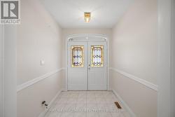 WELCOMING FOYER WITH SKYLIGHT - 