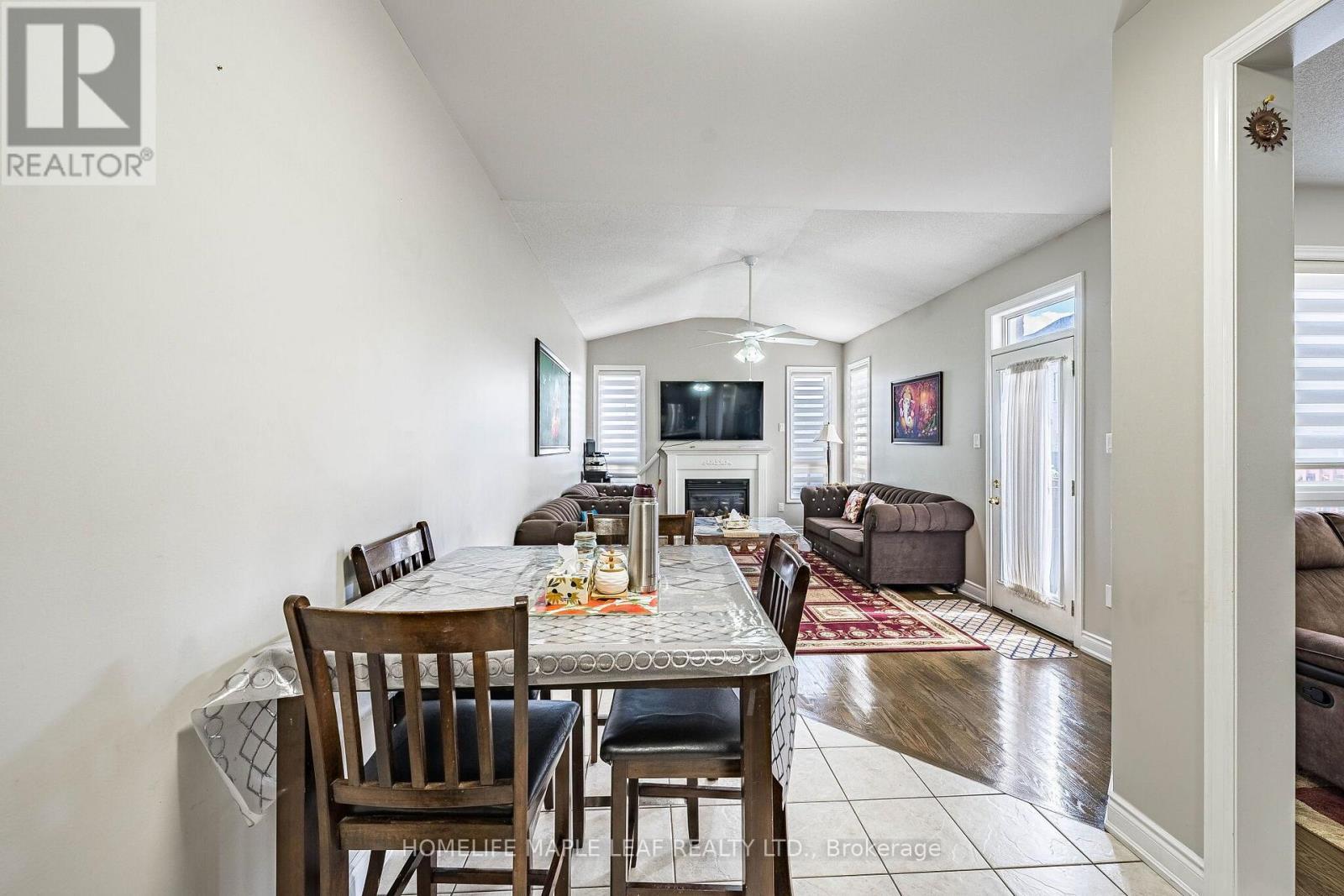 29 Gower Crescent, Brampton, ON - Indoor Photo Showing Dining Room With Fireplace