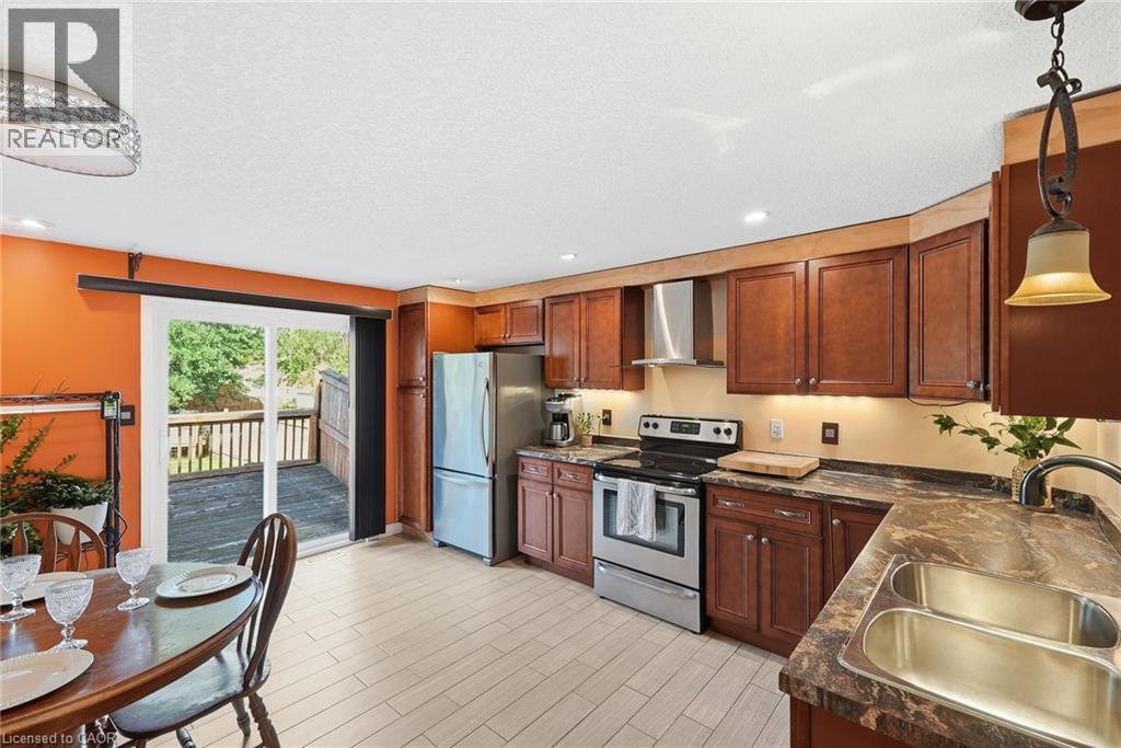 46 Andrews Drive, Drayton, ON - Indoor Photo Showing Kitchen With Double Sink