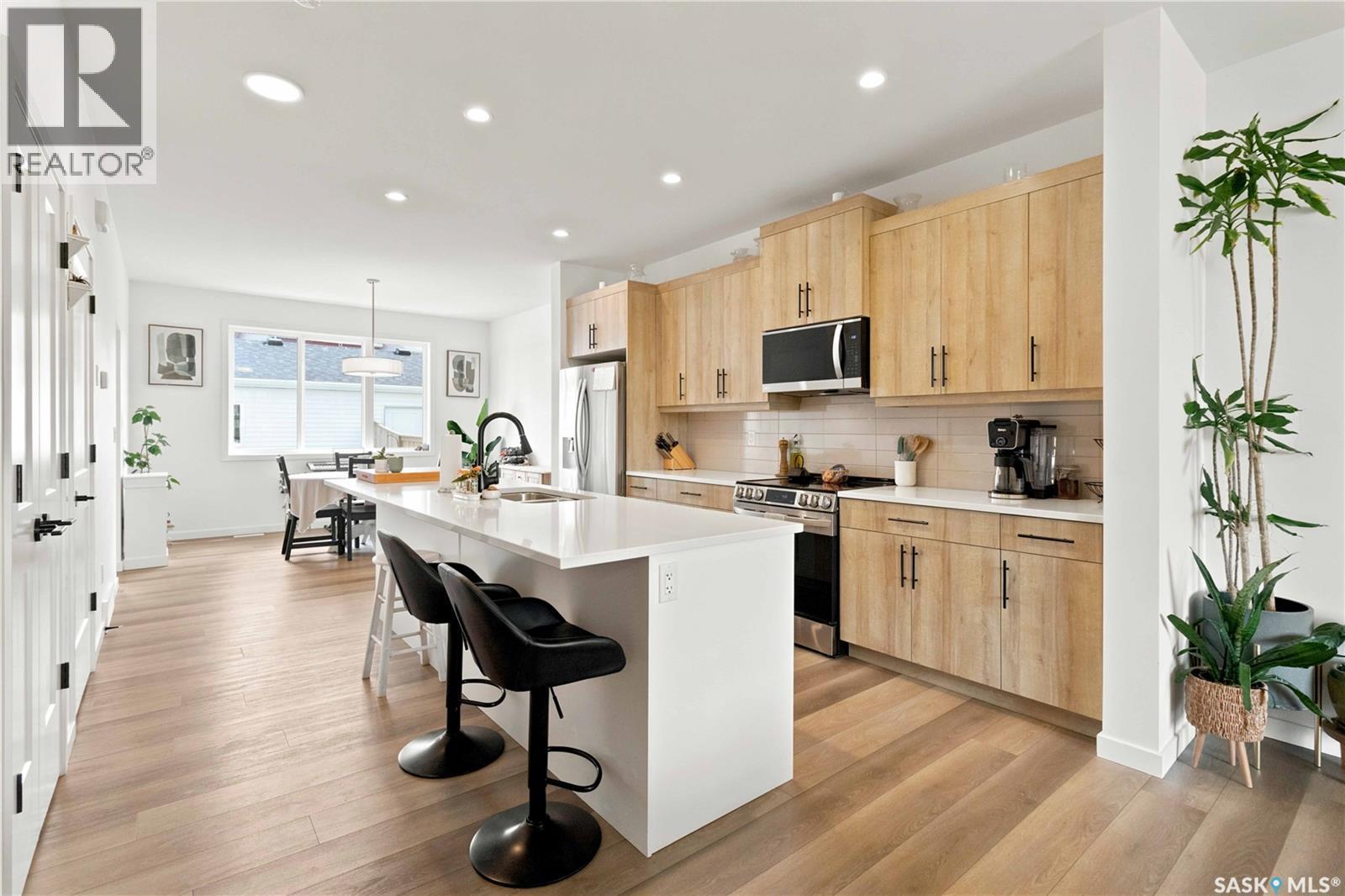 3089 Brighton Common, Saskatoon, SK - Indoor Photo Showing Kitchen With Stainless Steel Kitchen With Upgraded Kitchen