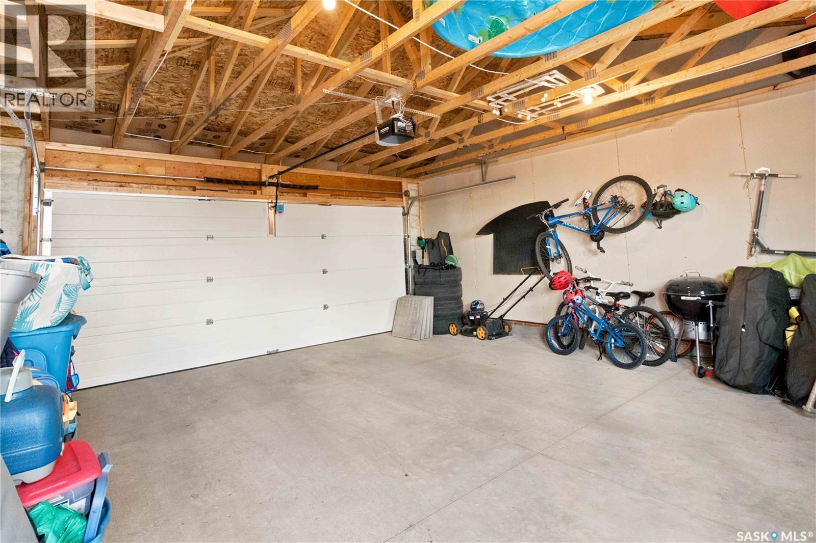 3089 Brighton Common, Saskatoon, SK - Indoor Photo Showing Garage