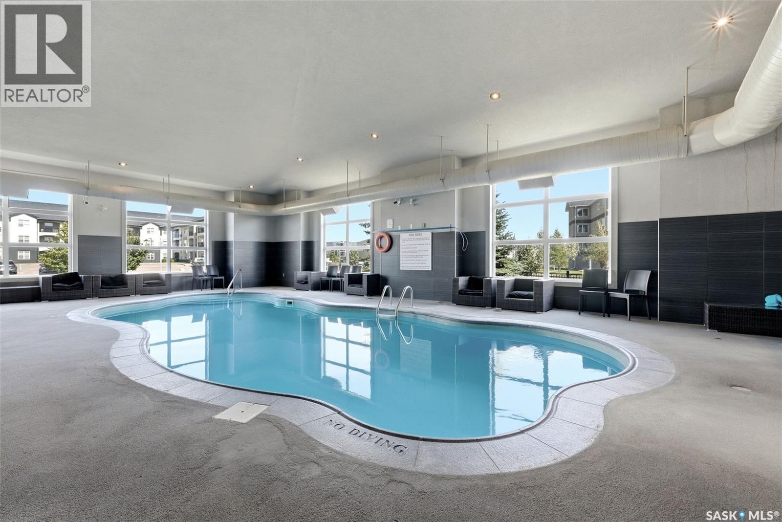 205 1610 Dakota Drive, Regina, SK - Indoor Photo Showing Other Room With In Ground Pool