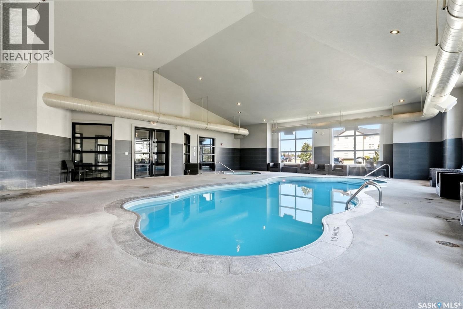 205 1610 Dakota Drive, Regina, SK - Indoor Photo Showing Other Room With In Ground Pool