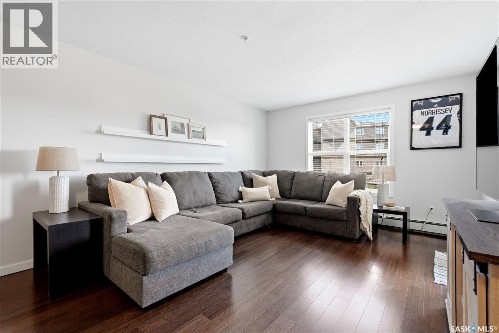 205 1610 Dakota Drive, Regina, SK - Indoor Photo Showing Living Room