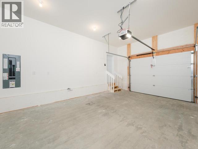 20 Quick Street, Whitehorse, YT - Indoor Photo Showing Garage