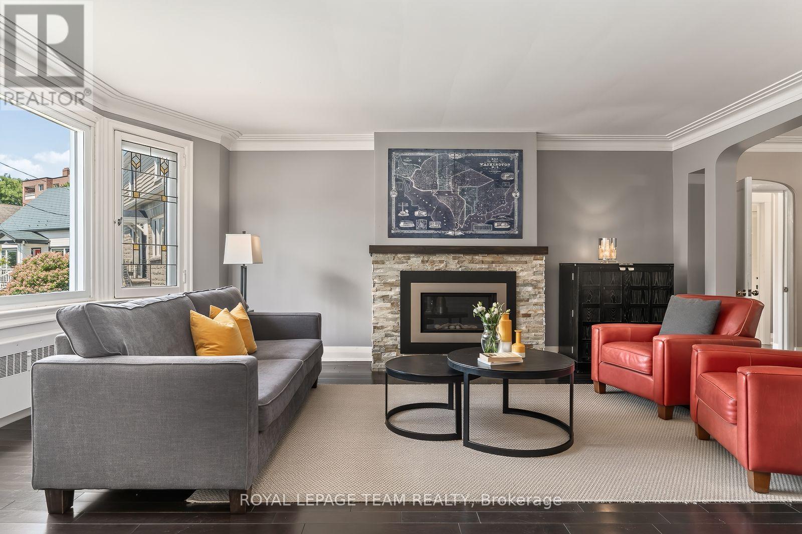 111 Ivy Crescent, Ottawa, ON - Indoor Photo Showing Living Room With Fireplace