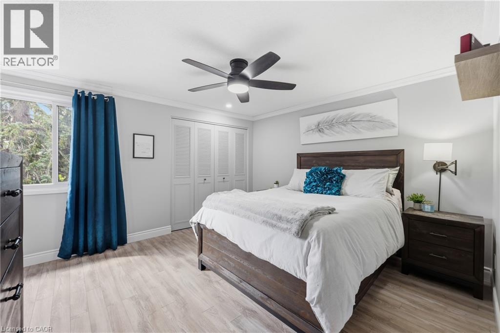 Primary Bedroom with his & hers closets - 25 Flint Drive, Kitchener, ON - Indoor Photo Showing Bedroom