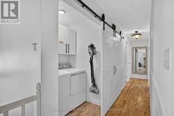 Main level laundry with sliding door - 