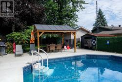 Inground pool with pergola and pool shed - 