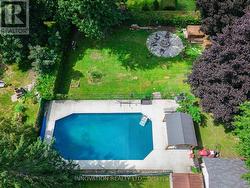 Aerial view of pool, sheds, pergola & fire pit - 