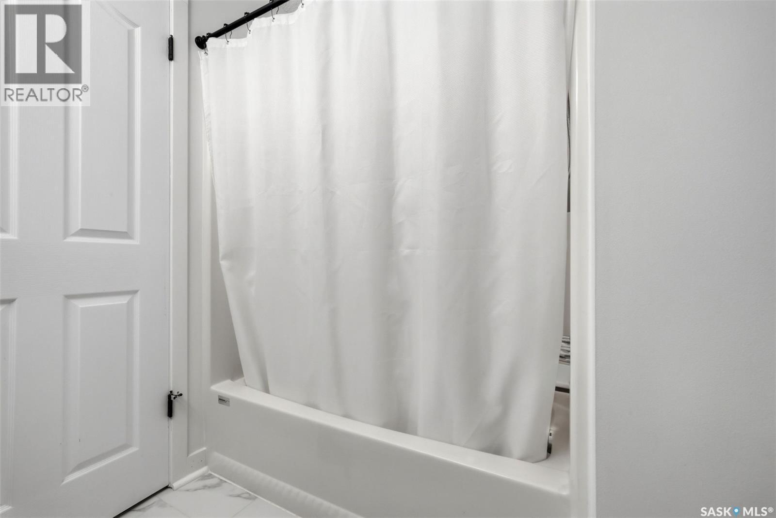 7310 Cribbs Bay, Regina, SK - Indoor Photo Showing Other Room