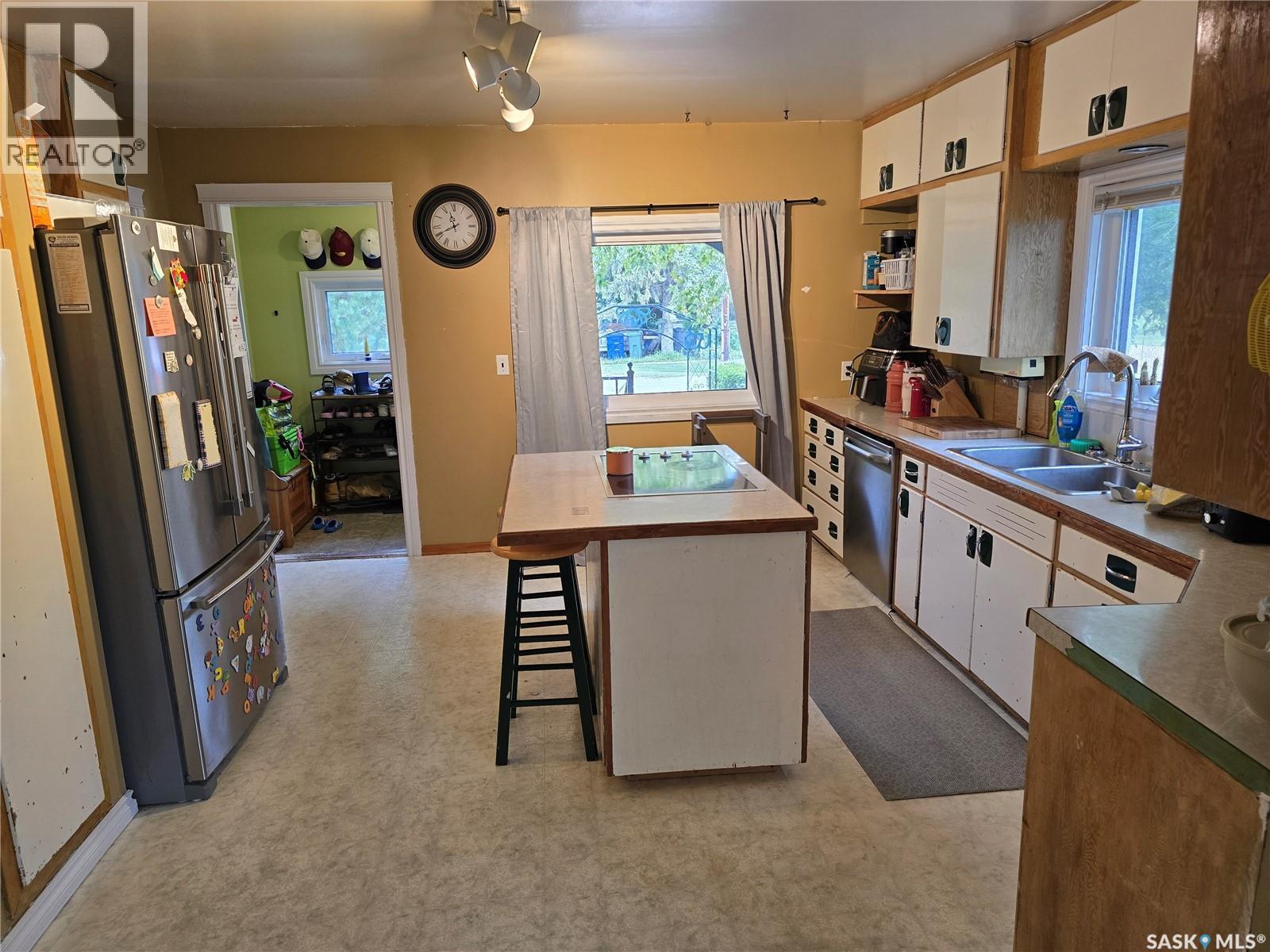 127 1St Avenue, Osler, SK - Indoor Photo Showing Kitchen With Double Sink