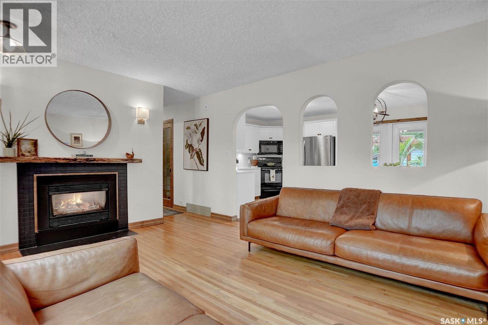 2807 Fleury Street, Regina, SK - Indoor Photo Showing Living Room With Fireplace