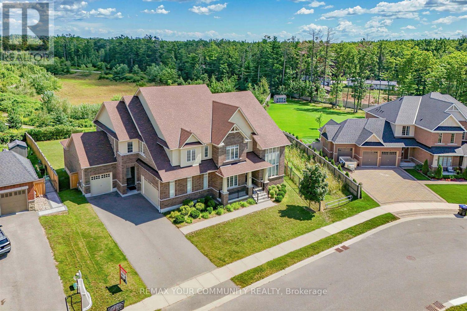 19 Redmond Crescent, Springwater, ON - Outdoor With Facade