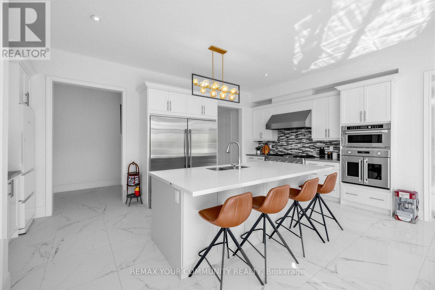 19 Redmond Crescent, Springwater, ON - Indoor Photo Showing Kitchen With Double Sink With Upgraded Kitchen