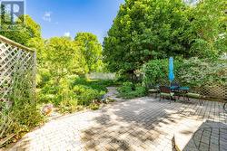Rear patio with view of the gardens - 