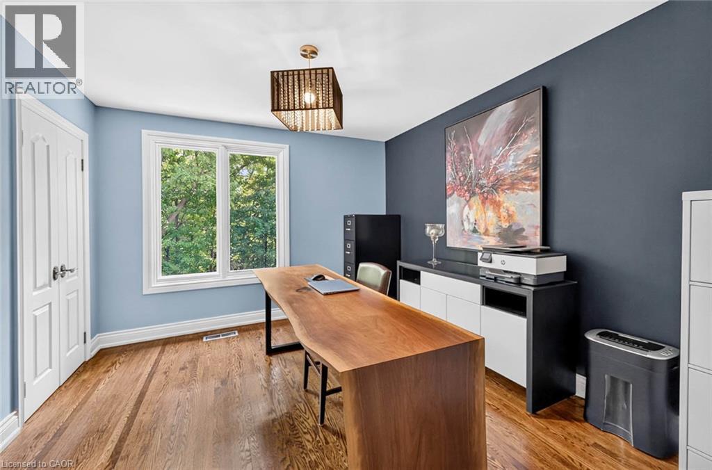 Hardwood flooring, white trim, and a white paneled door - 11 Christman Court, Markham, ON - Indoor Photo Showing Office