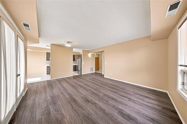 306-1840 Henderson Hwy, Winnipeg, MB - Indoor Photo Showing Other Room With Fireplace