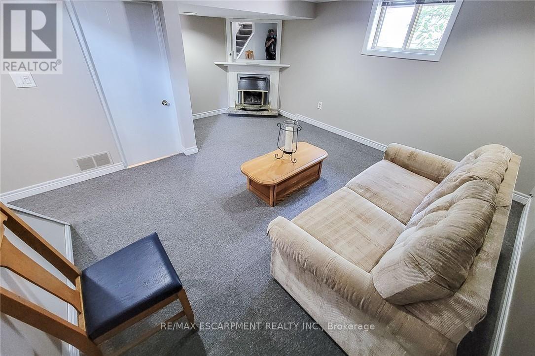 42 Lake Avenue N, Hamilton, ON - Indoor With Fireplace
