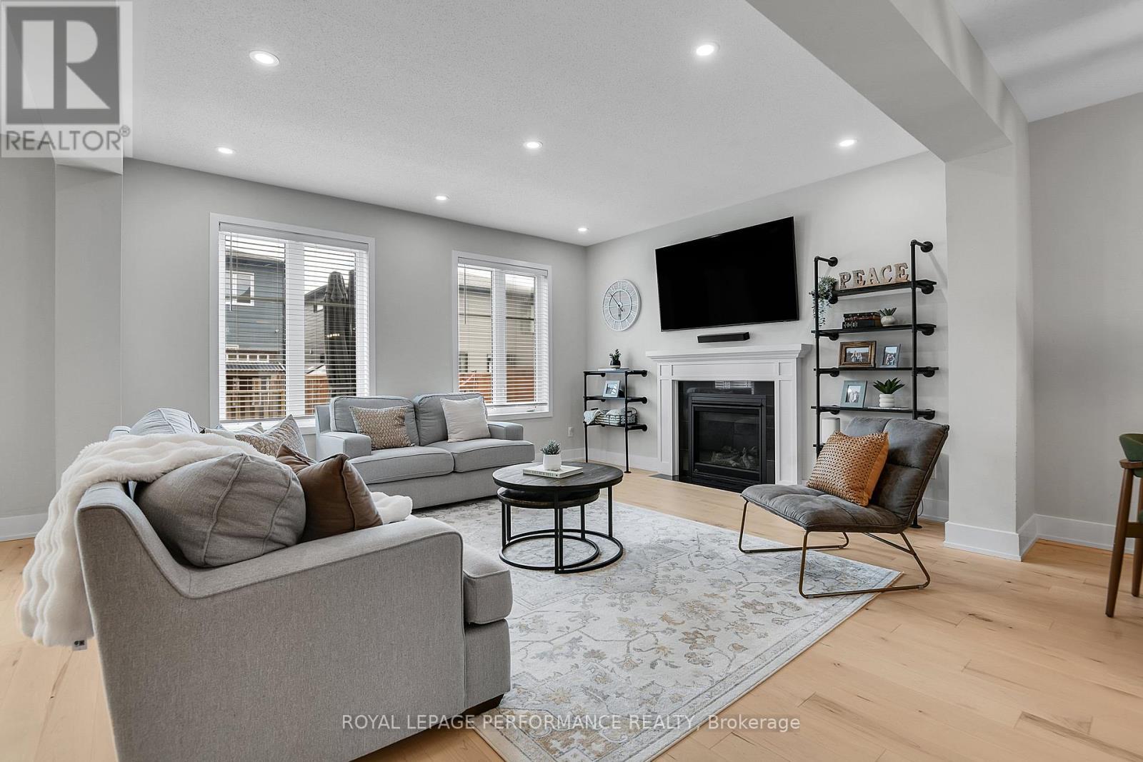 56 Pelham Crescent, Ottawa, ON - Indoor Photo Showing Living Room With Fireplace