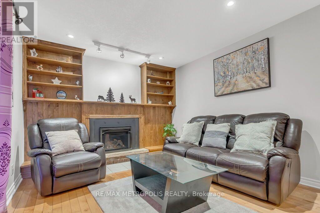 100 Warren Road, Kitchener, ON - Indoor Photo Showing Living Room With Fireplace