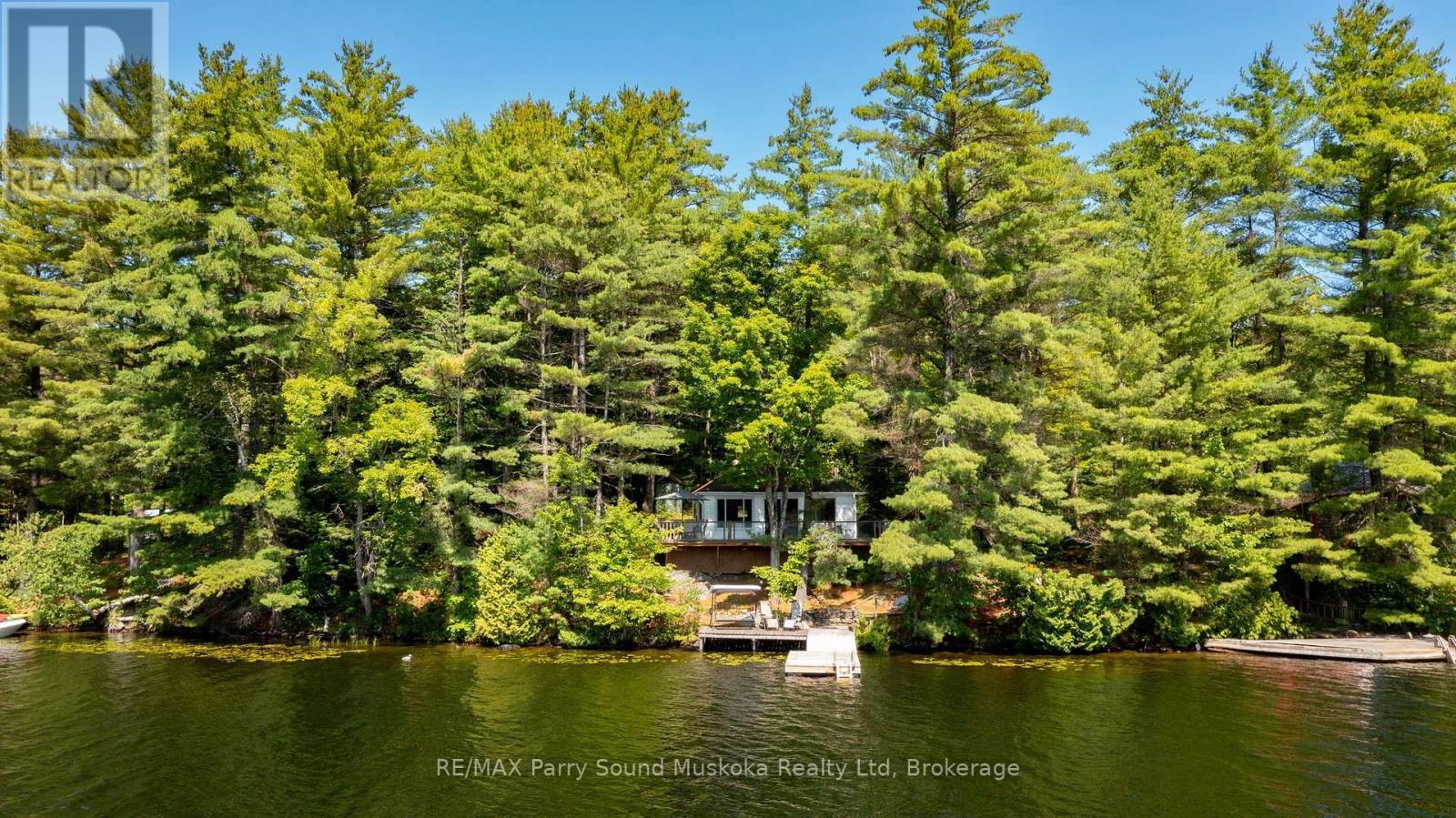 Turn-key Cottage Getaway! - 4 Post Lane, Seguin, ON - Outdoor With Body Of Water