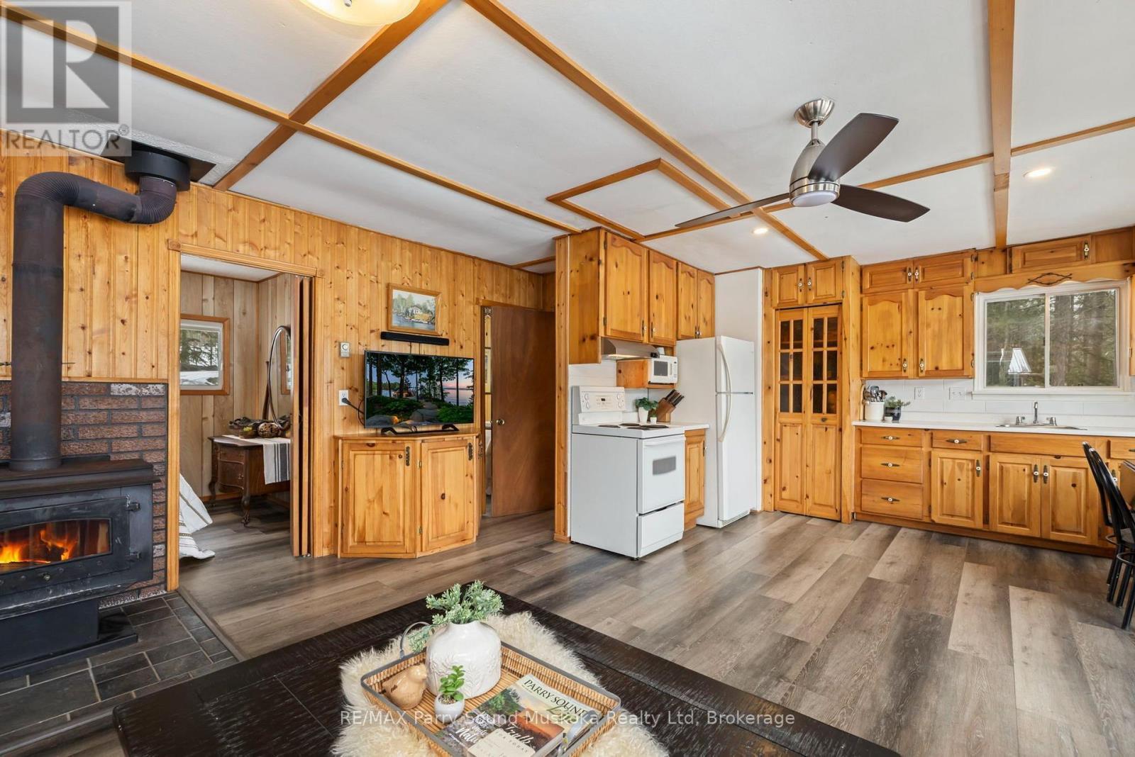 4 Post Lane, Seguin, ON - Indoor Photo Showing Kitchen With Fireplace