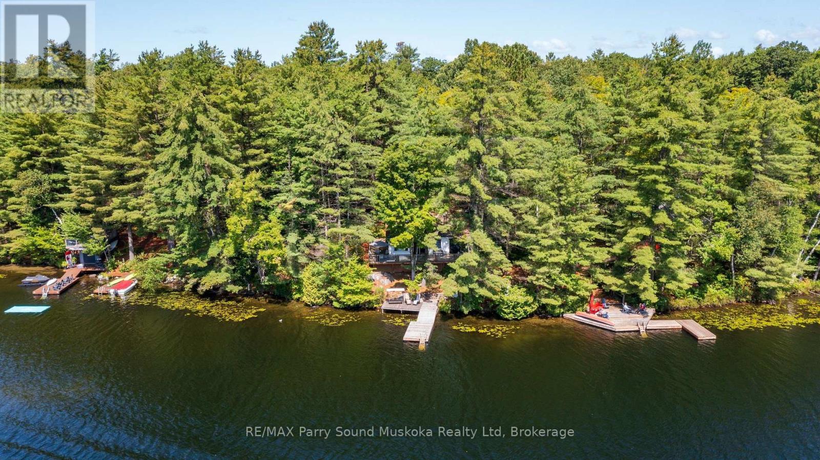Cottage life begins here! - 4 Post Lane, Seguin, ON - Outdoor With Body Of Water