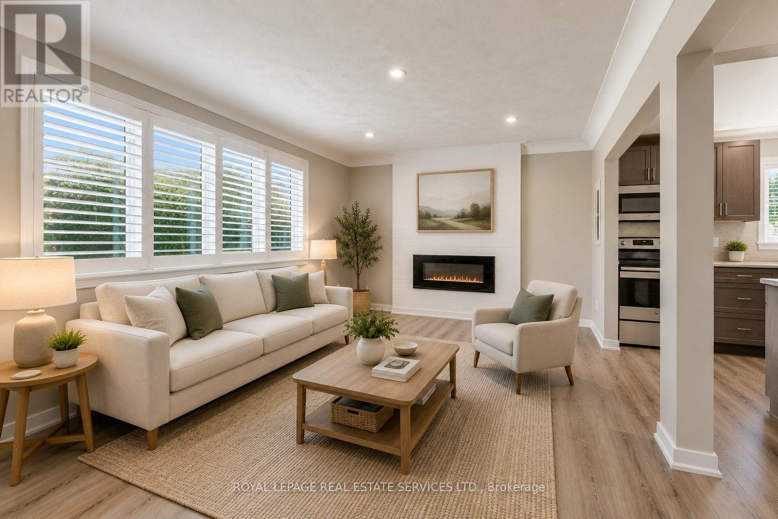 191 Nash Road N, Hamilton, ON - Indoor Photo Showing Living Room With Fireplace
