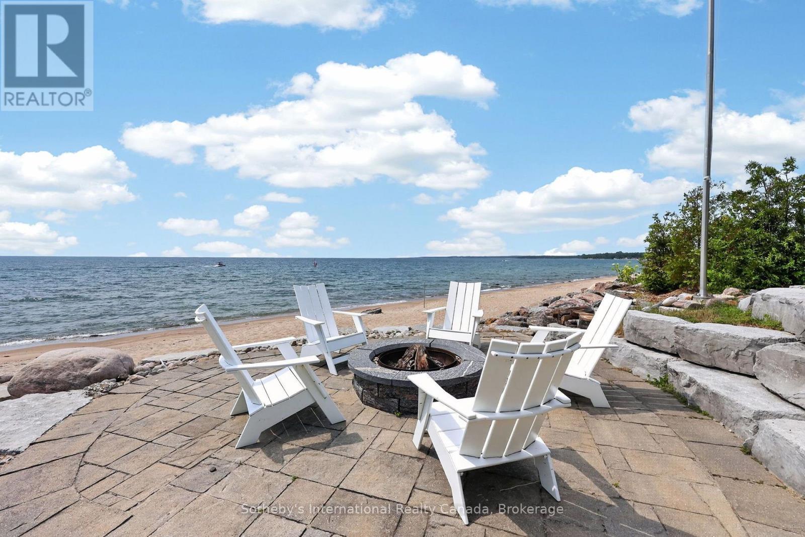 10 Lundy Lane, Tiny, ON - Outdoor With Body Of Water With Deck Patio Veranda With View