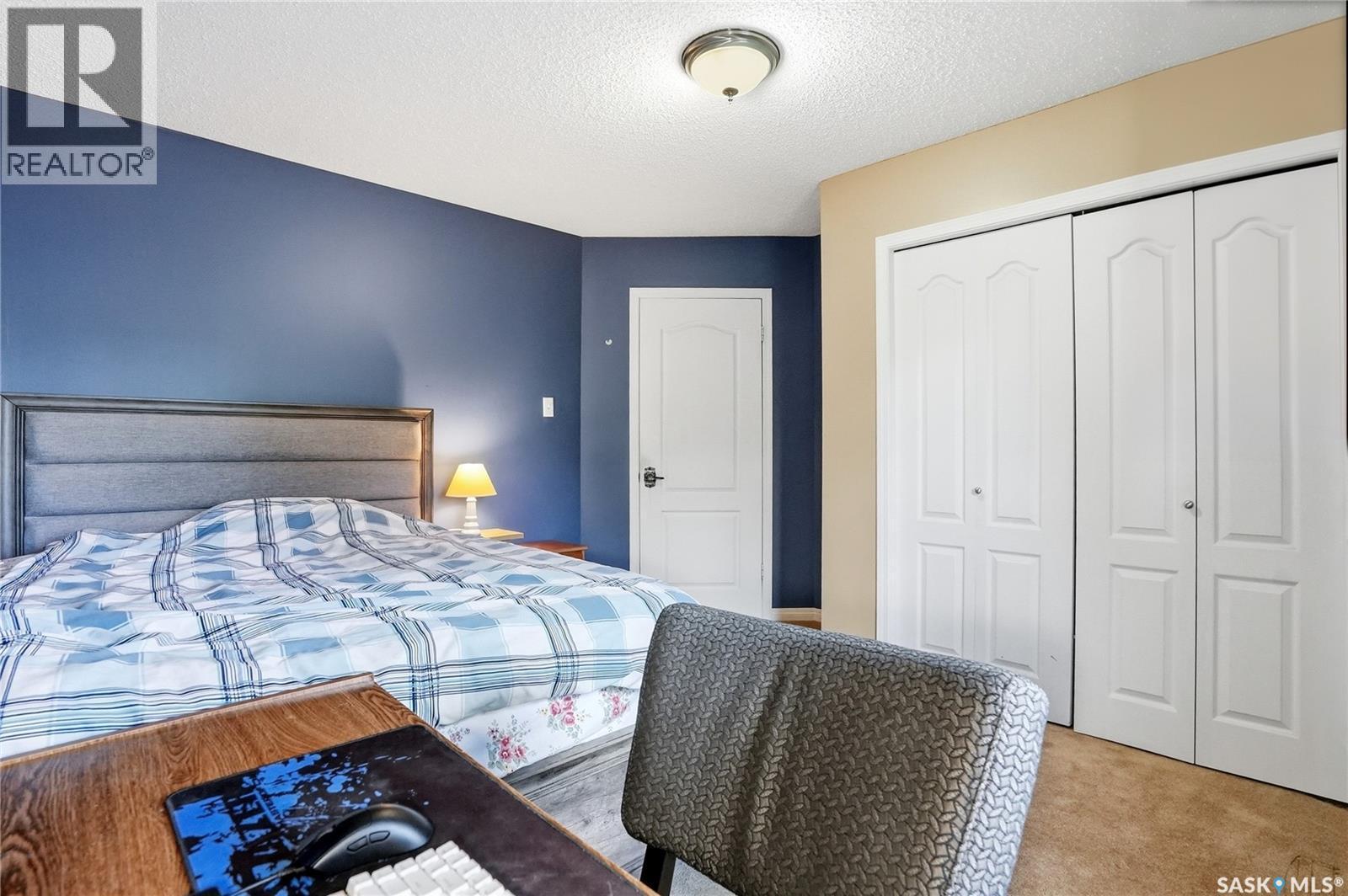 130 Mulcaster Crescent, Saskatoon, SK - Indoor Photo Showing Bedroom