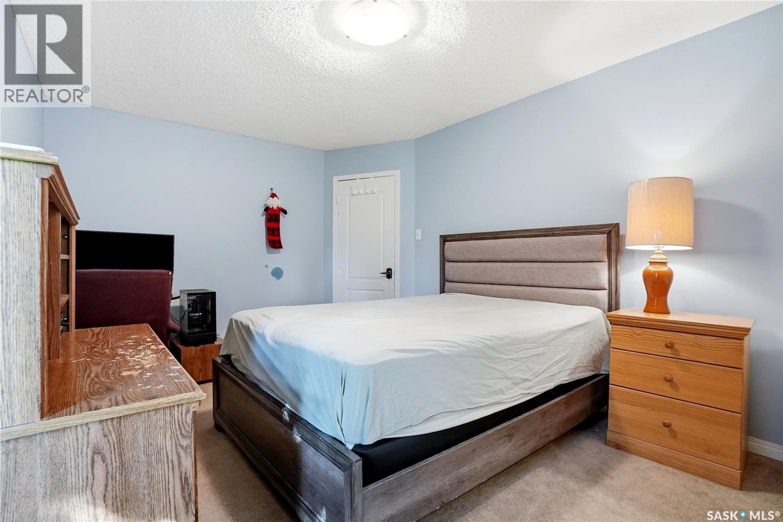130 Mulcaster Crescent, Saskatoon, SK - Indoor Photo Showing Bedroom