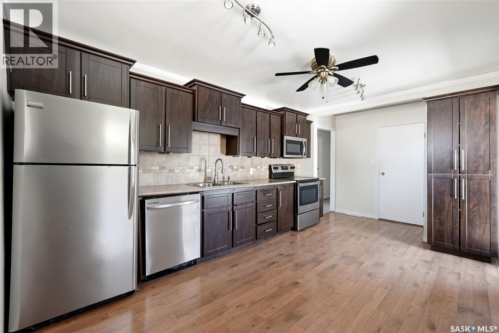 1410 4Th Avenue N, Regina, SK - Indoor Photo Showing Kitchen With Stainless Steel Kitchen With Double Sink