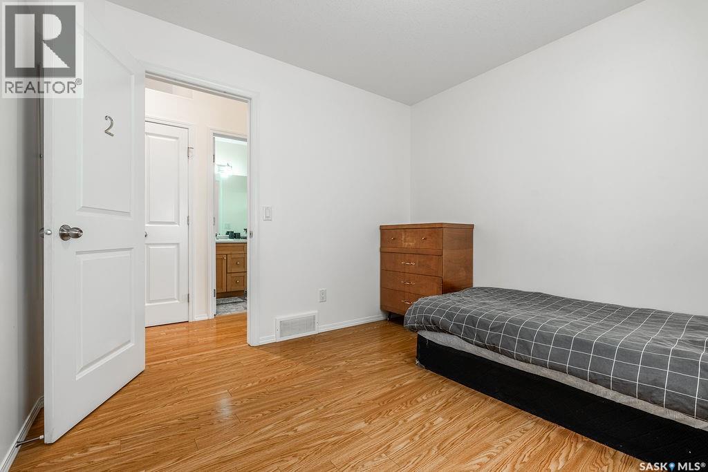 115 Blackstock Cove, Saskatoon, SK - Indoor Photo Showing Bedroom