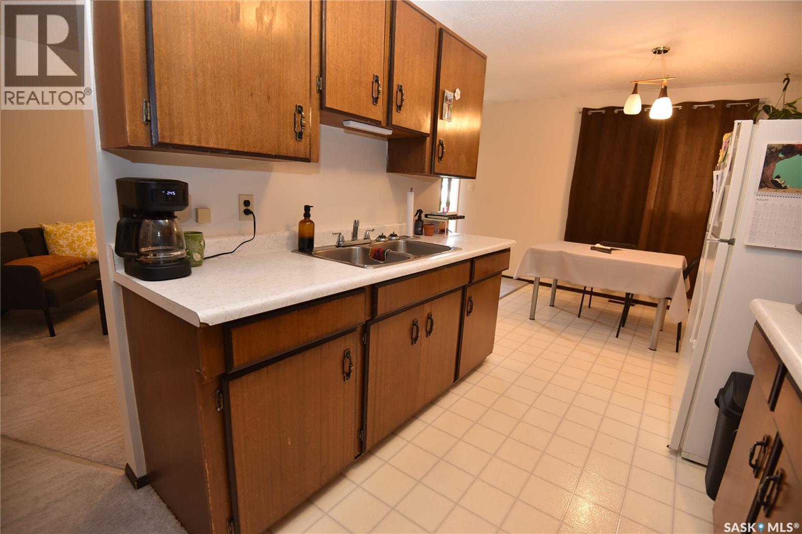 307 6Th Street E, Nipawin, SK - Indoor Photo Showing Kitchen With Double Sink