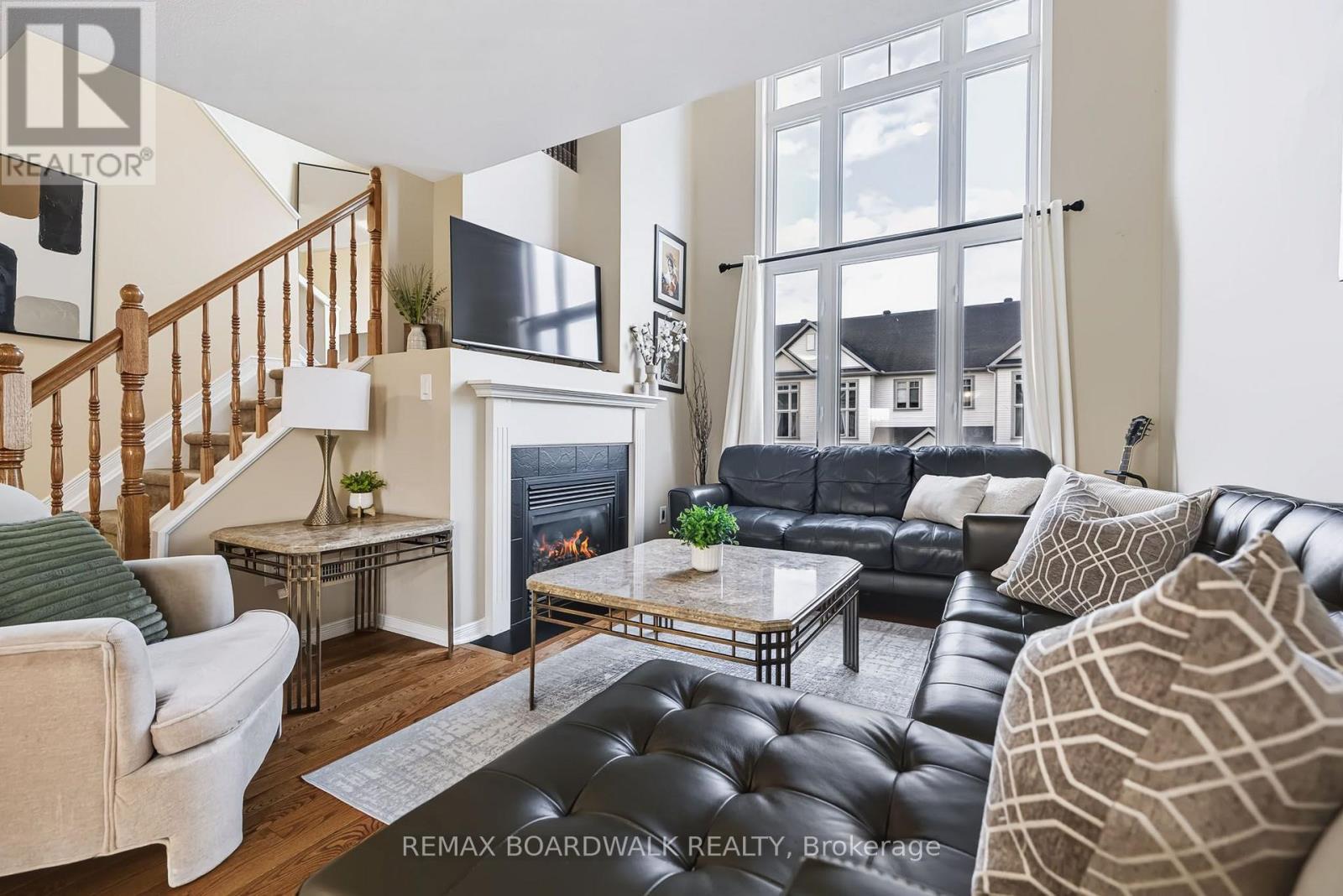 Spacious Living Room w/its cozy Gas Fireplace - 312 Galston Private, Ottawa, ON