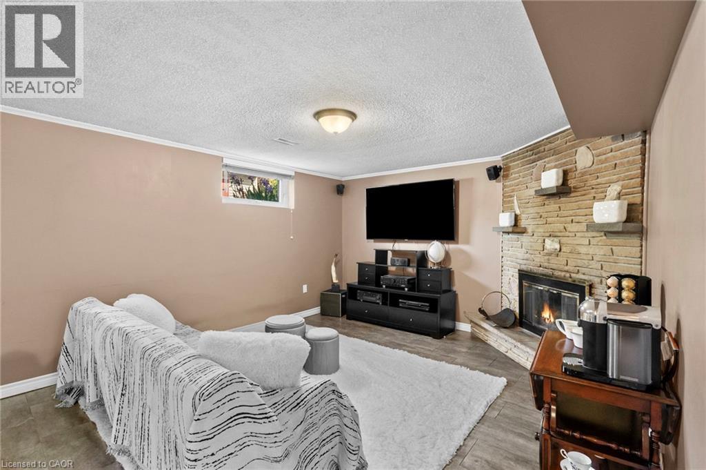 Expansive family / rec area in the lower level featuring luxury vinyl flooring. - 1083 Melton Drive, Mississauga, ON