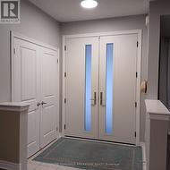 Step inside through a grand double door entry - 
