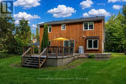 Cedar-Sided Two-Storey Rear Elevation + Large Deck - 